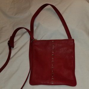 deep red Coach crossbody messenger bag with detail